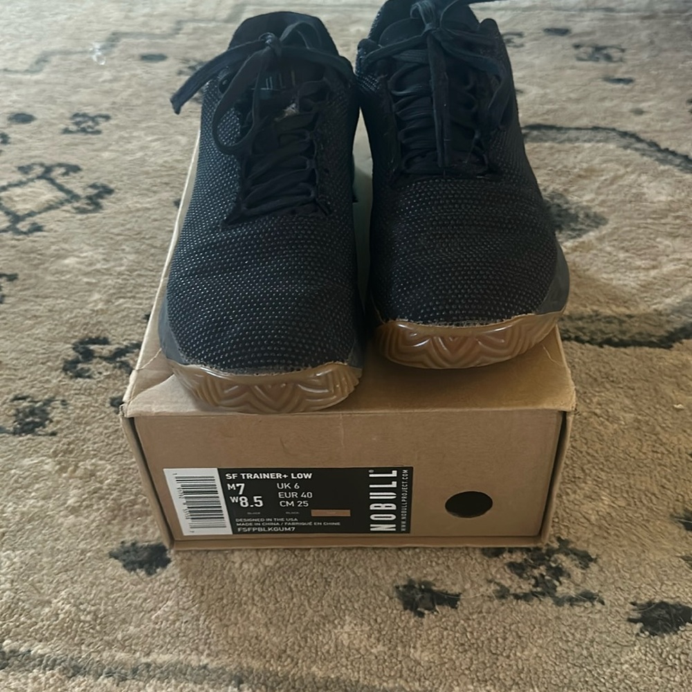 Black NoBull trainer+ tennis shoes.